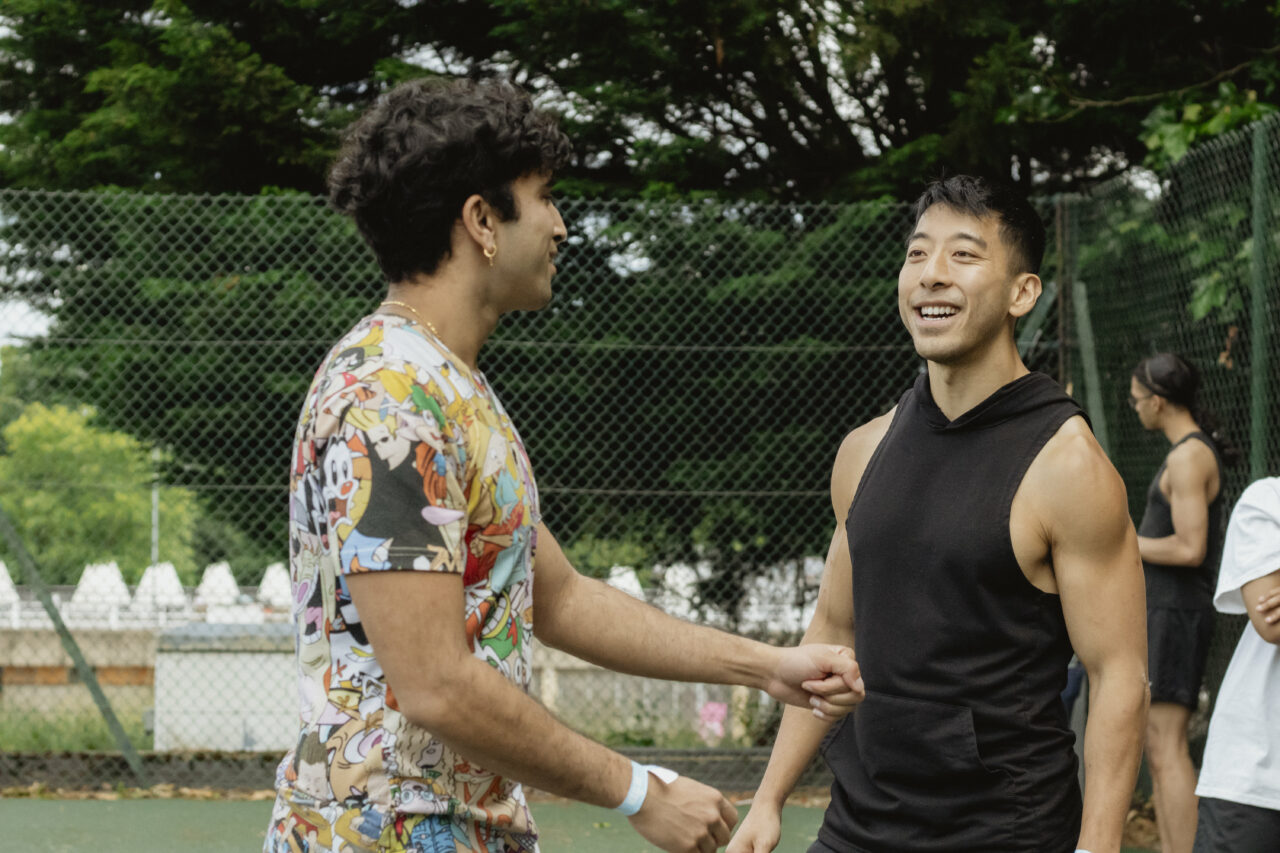 two volunteers talking to each other
